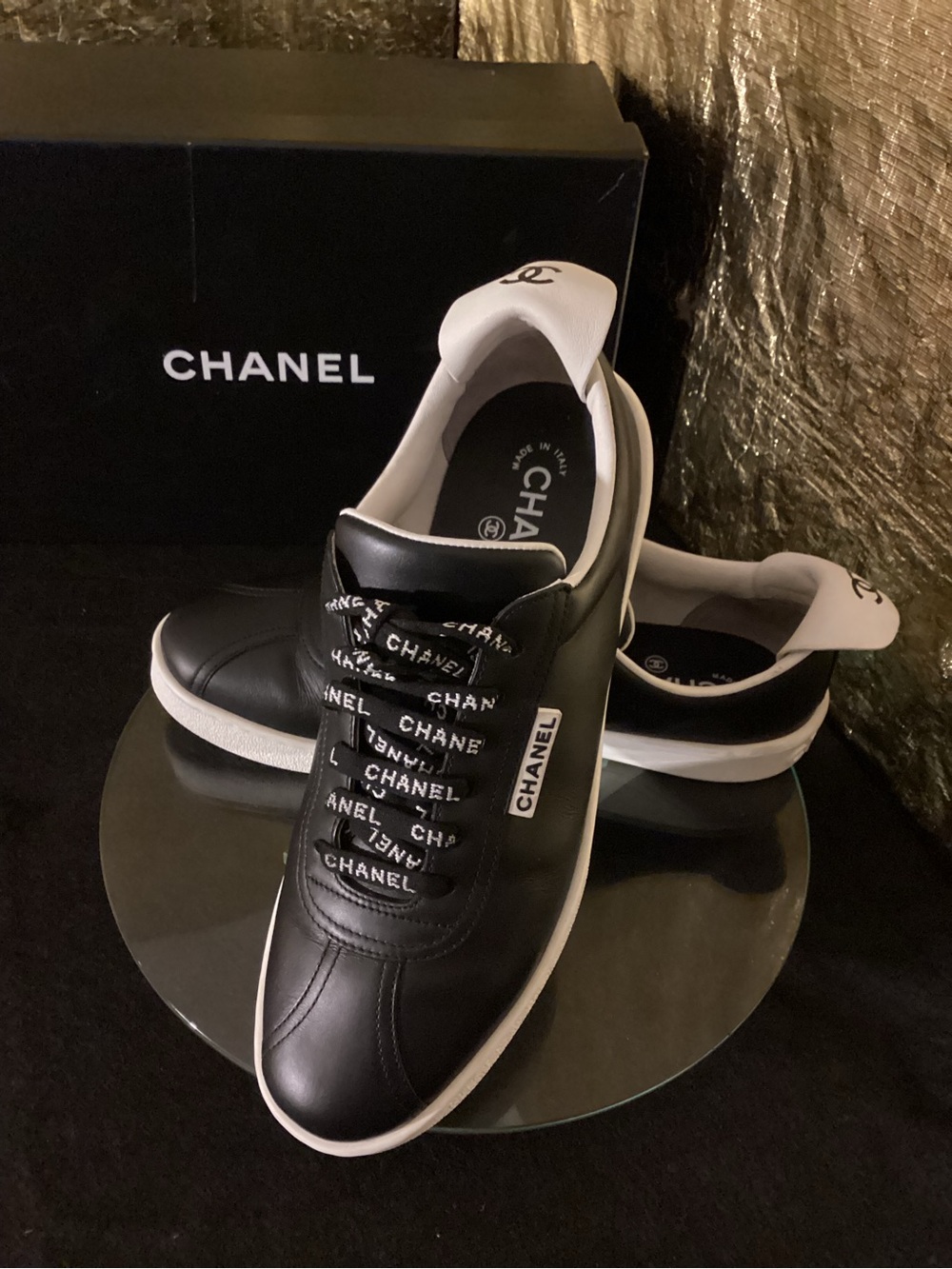 CHANEL Black and White Logo-Trim Leather Sneakers